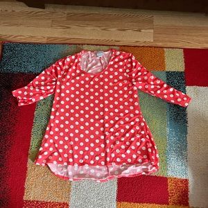 Pink shirt with white polkadots
